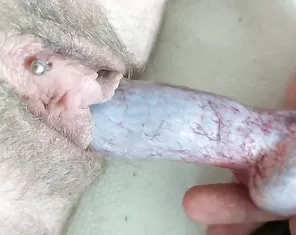 Wife Lena stuck the dog's dick with a knot in her pussy